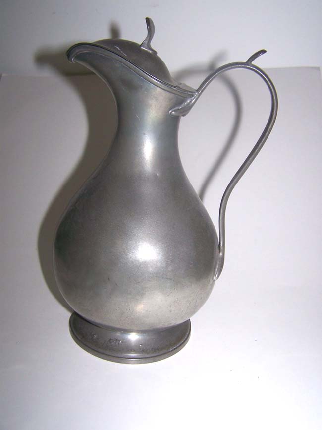An Antique English Pewter Wine or Ale Jug circa 1870 stamped 'Philip Ashberry & Sons, Sheffield.'